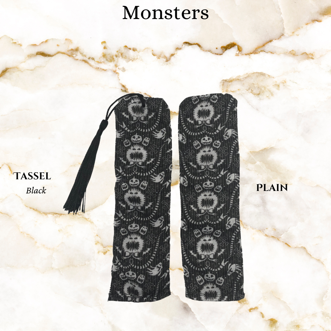 black fabirc with white monsters fabric bookmark - 1 plain and 1 with black tassel